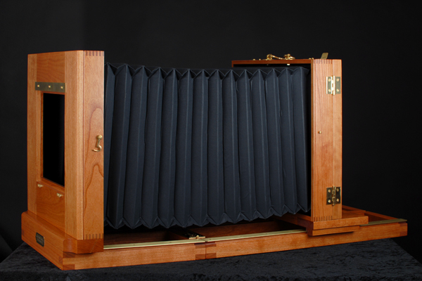 Camera with tailboard unfolded