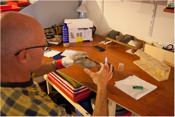 Jacques varnishing his plate