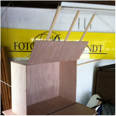 The opened box, with the bars to hold the dark cloth